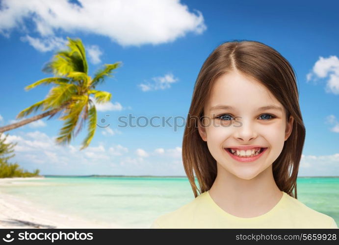 happiness and people concept - smiling little girl over white background