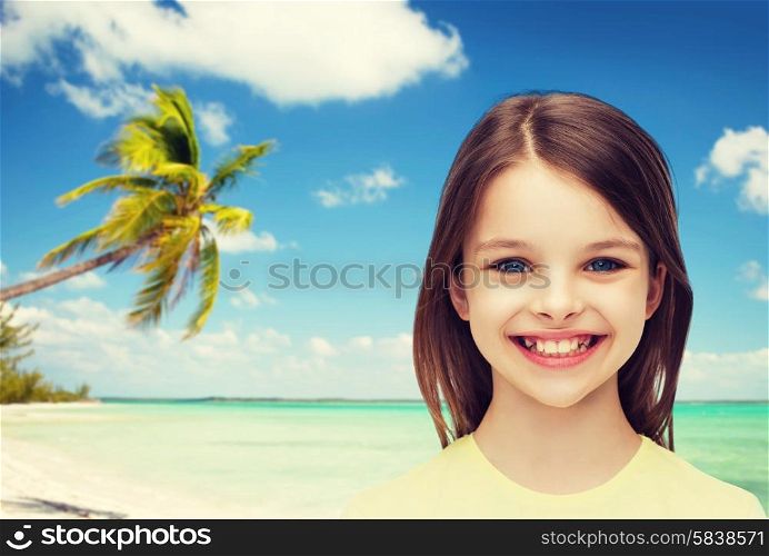 happiness and people concept - smiling little girl over white background