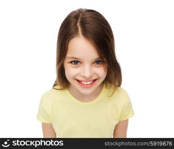 happiness and people concept - smiling little girl over white background. smiling little girl over white background
