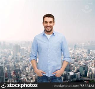 happiness and people concept - smiling man