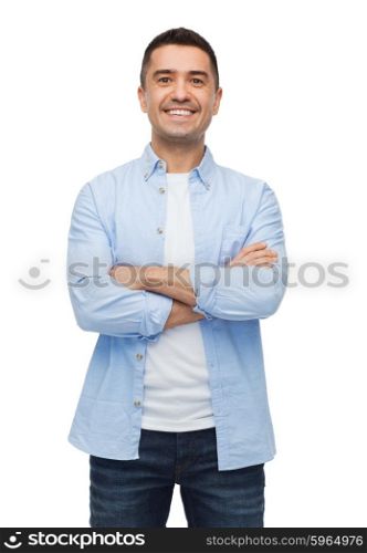 happiness and people concept - smiling man with crossed arms. smiling man with crossed arms