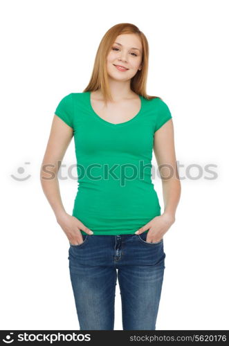 happiness and people concept - smiling teenage girl in casual clothes