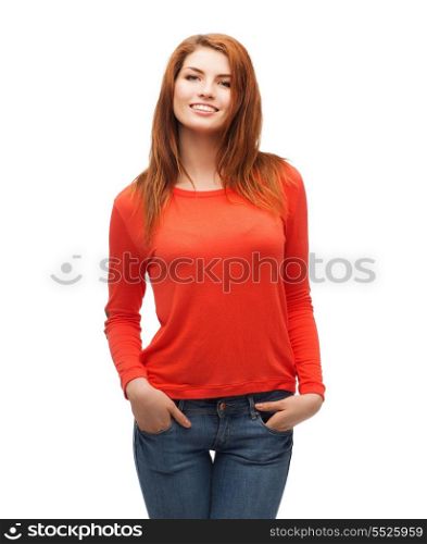 happiness and people concept - smiling teenager in casual top and jeans