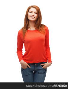 happiness and people concept - smiling teenager in casual top and jeans