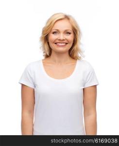 happiness and people concept - smiling woman in blank white t-shirt. smiling woman in blank white t-shirt