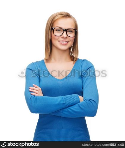 happiness and people concept - smiling young woman in casual clothes and black eyeglasses