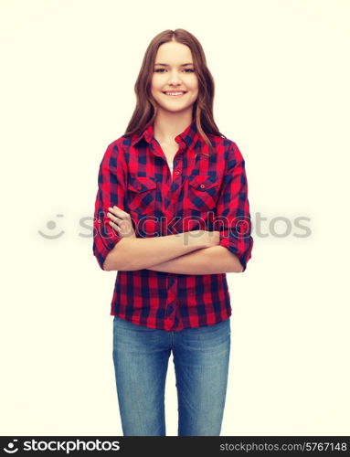 happiness and people concept - smiling young woman in casual clothes with crossed arms