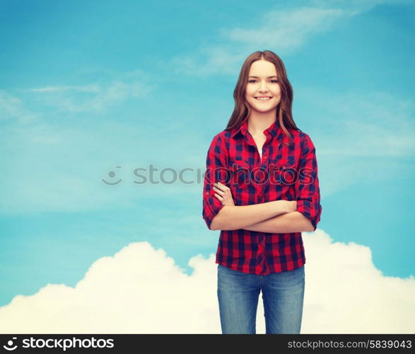 happiness and people concept - smiling young woman in casual clothes with crossed arms