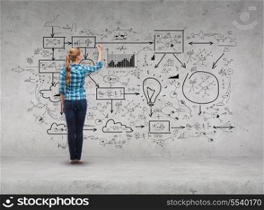 happiness and people concept - smiling young woman writing or drawing big plan on virtual screen