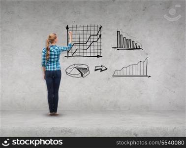 happiness and people concept - smiling young woman writing or drawing growing chart on virtual screen