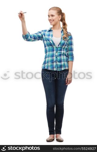 happiness and people concept - smiling young woman writing or drawing something on virtual screen