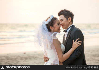 happiness and romantic Scene of love couples partners wedding on the Beach