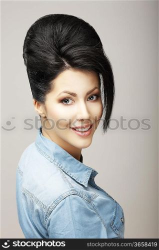 Happiness. Charisma. Sexy Brunette in Blue Jeans Jacket. Refinement