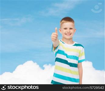 happiness, childhood and people concept - smiling little boy in casual clothes showing thumbs up over blue sky background