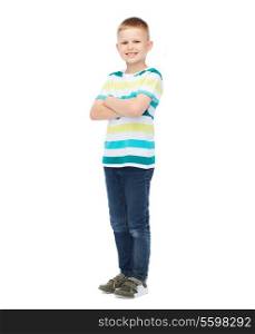 happiness, childhood and people concept - smiling little boy in casual clothes with crossed arms