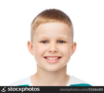 happiness, childhood and people concept - smiling little boy over white background