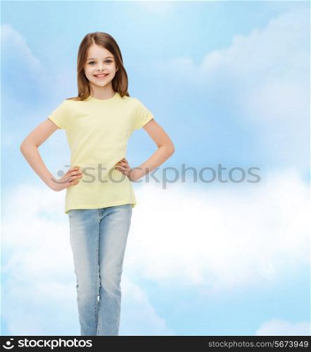 happiness, childhood and people concept - smiling little girl in casual clothes