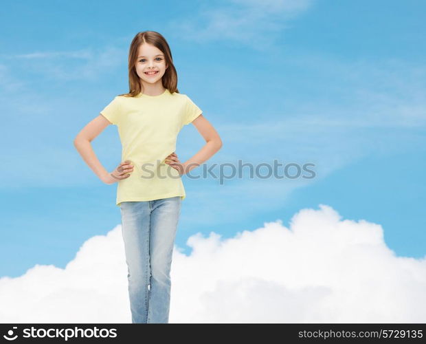 happiness, childhood and people concept - smiling little girl in casual clothes