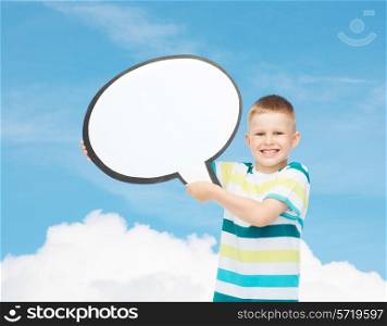 happiness, childhood, conversation and people concept - smiling little boy with blank text bubble over blue background