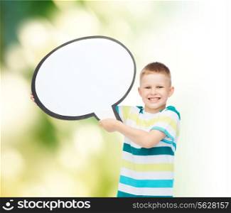 happiness, childhood, ecology, conversation and people concept - smiling little boy with blank text bubble over green background