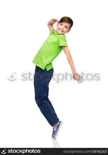 happiness, childhood, freedom, movement and people concept - smiling boy having fun or dancing