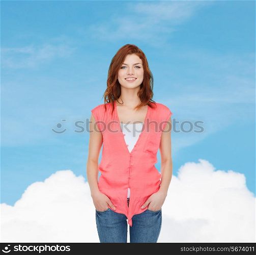 happiness, dream and people concept - smiling teenage girl in casual clothes over blue sky background