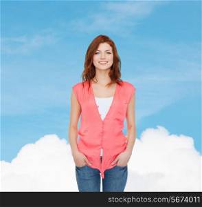 happiness, dream and people concept - smiling teenage girl in casual clothes over blue sky background