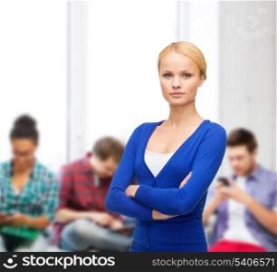 happiness, education and people concept - serious young woman in casual clothes