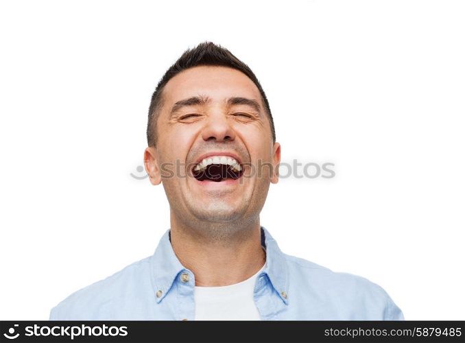 happiness, emotions and people concept - laughing man