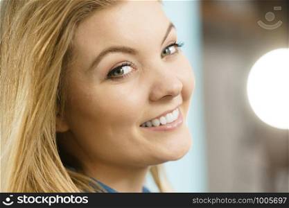 Happiness face expressions concept. Portrait of happy cheerful blonde woman smiling with joy. Portrait of happy blonde woman smiling with joy