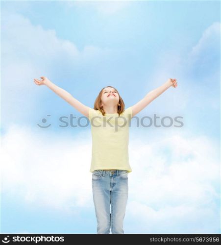 happiness, freedom, future concept - smiling teenage girl in with raised hands