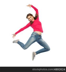 happiness, freedom, motion and people concept - happy young woman jumping or dancing in air over white background