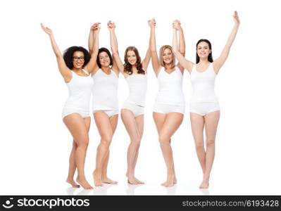 happiness, friendship, beauty, body positive and people concept - group of happy different women in white underwear with raised arms celebrating victory