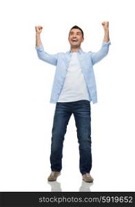happiness, gesture and people concept - happy laughing man with raised hands