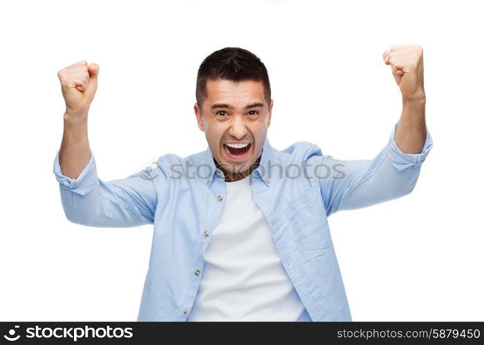 happiness, gesture, emotions and people concept - happy laughing man with raised hands