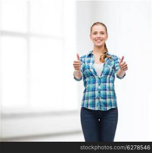 happiness, gesutre and people concept - smiling young woman in casual clothes showing thumbs up