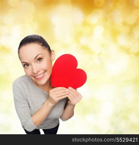 happiness, love and health concept - smiling asian woman with red heart