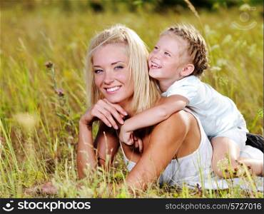 Happiness of the mother and daughter - people on nature