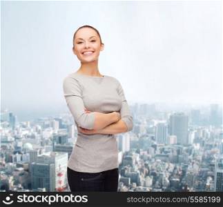 happiness people concept - smiling asian woman with crossed arms over white background