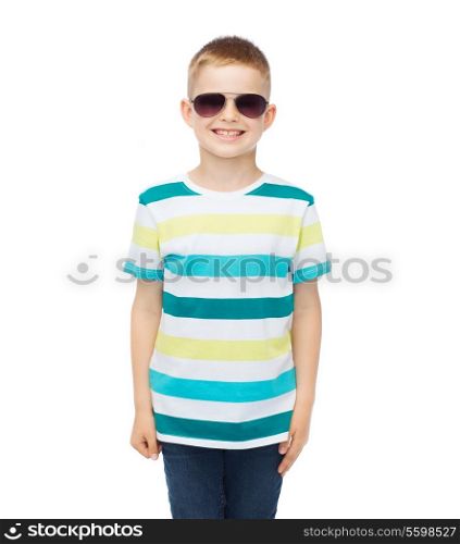 happiness, summer and people concept - smiling cute little boy in sunglasses