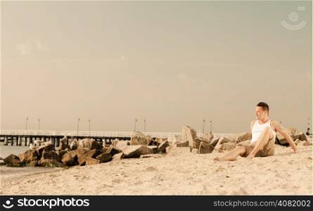 Happiness summer vacation and people concept. Fashion portrait handsome man full length on the beach landscape