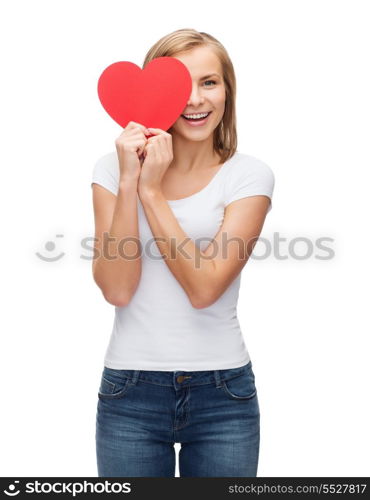 happiness, t-shirt design, health and love concept - smiling woman in blank white t-shirt with covering half face with heart