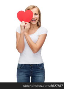 happiness, t-shirt design, health and love concept - smiling woman in blank white t-shirt with covering half face with heart