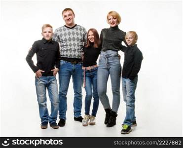 Happy adult large family in casual clothes, full length portrait, isolated on white background a. Happy adult large family in casual clothes, full length portrait, isolated on white background