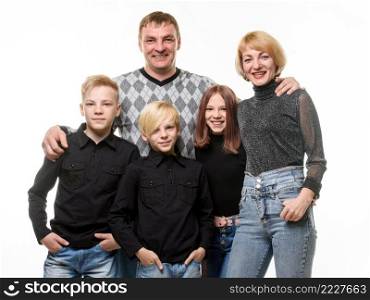 Happy adult large family in casual clothes, isolated on white background a. Happy adult large family in casual clothes, isolated on white background