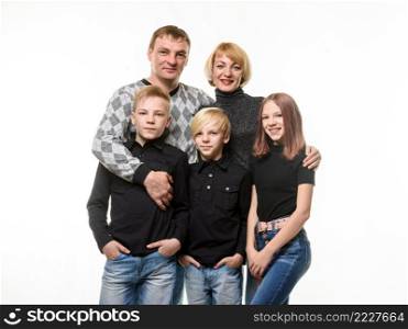 Happy adult large family of Slavic appearance in casual clothes, isolated on white background a. Happy adult large family of Slavic appearance in casual clothes, isolated on white background