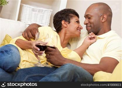 Happy African American Man & Woman Couple Drinking Wine