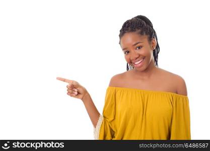 Happy african girl pointing, isolated on white background. happy girl