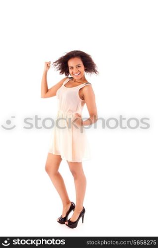 Happy african woman celebrating on white background