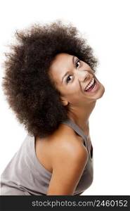 Happy Afro-American young woman isolated on white laughing